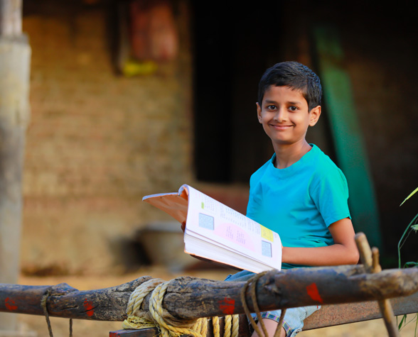 Poor Child Studying Home