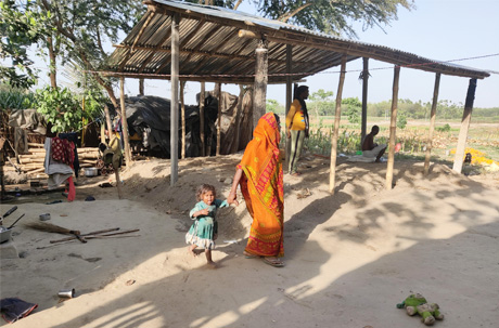 Mother With Child In Village